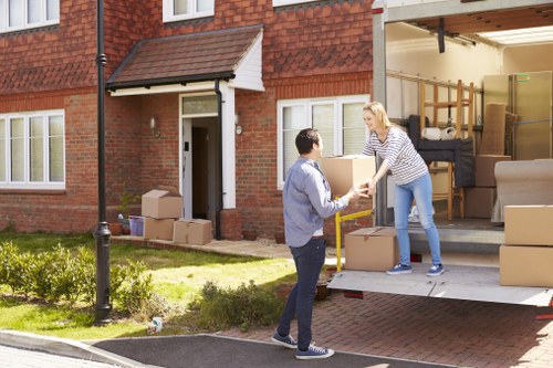 Man and van loading furniture in West Hendon for a local residential move
