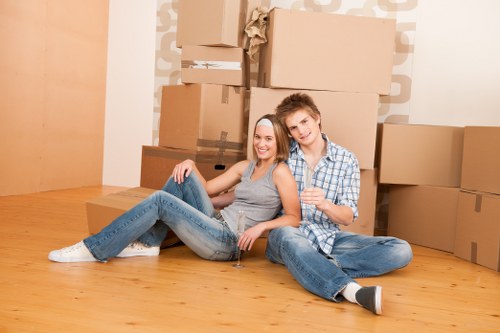Removal team planning a move in West Hendon near residential flats