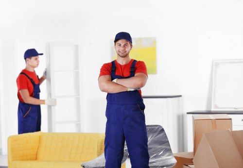 Careful handling of items through a doorway during a Westhendon man and van move