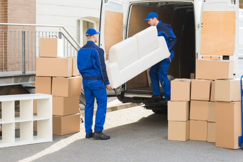 Man with van loading furniture for a Westhendon service
