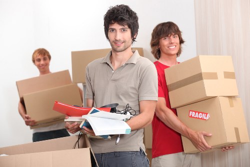 Packed boxes and furniture ready for a local house move