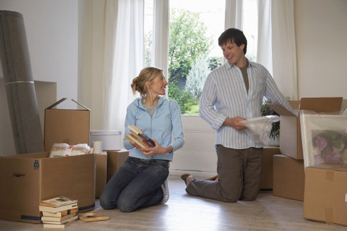 Furniture removal team handling access challenges in West Hendon