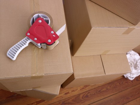Careful handling of furniture during a house move in West Hendon
