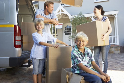 Moving truck and crew prepared for a property move around West Hendon