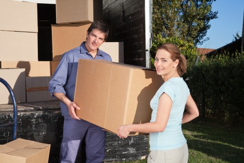 Packed boxes and furniture ready for a house or flat removal in West Hendon